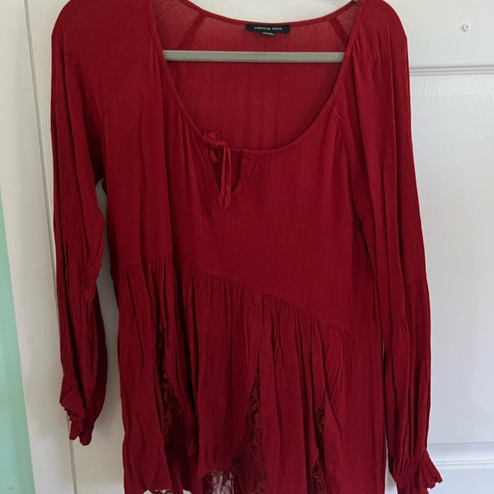 Red long sleeve shirt. Super light and comfortable. Size M
